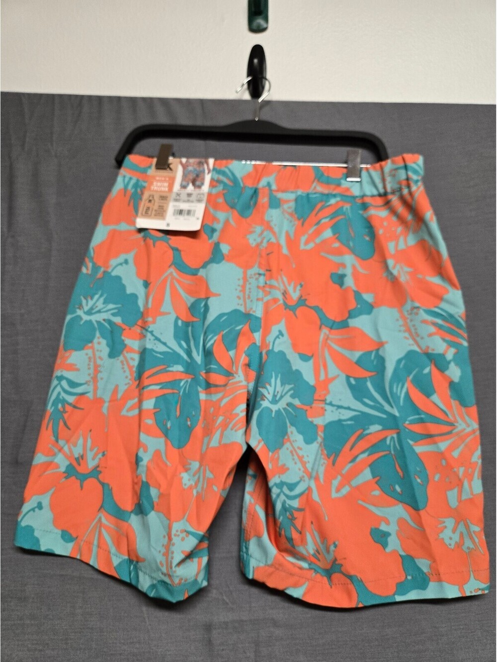 ZeroXposur slim fit turquoise and coral floral swim trunks size S